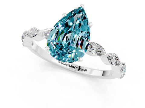 White gold Pear Cut Blue Topaz Ring with Marquise Side Stones and Prong Setting_1