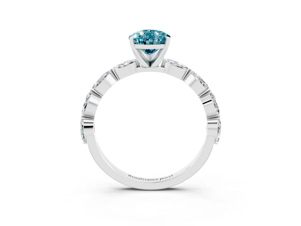 White gold Pear Cut Blue Topaz Ring with Marquise Side Stones and Prong Setting