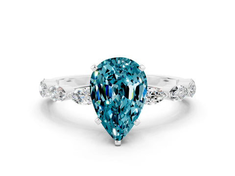 White gold Pear Cut Blue Topaz Ring with Marquise Side Stones and Prong Setting