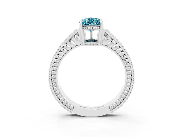 White gold Pear Cut Blue Topaz Ring with Milgrain Pavé Band and Four-Prong Setting