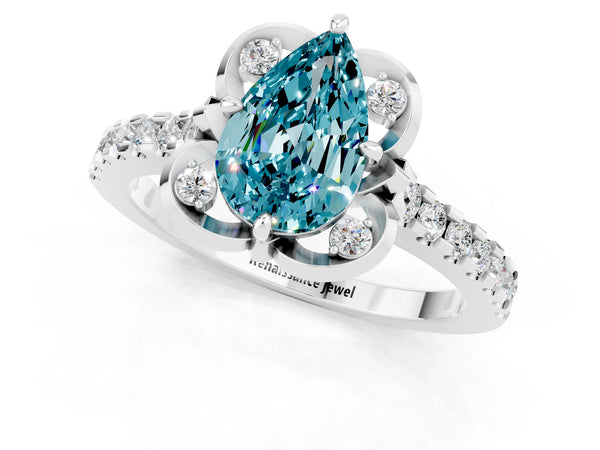 White gold Pear Cut Blue Topaz Ring with Pavé Band and Floral Prong Setting