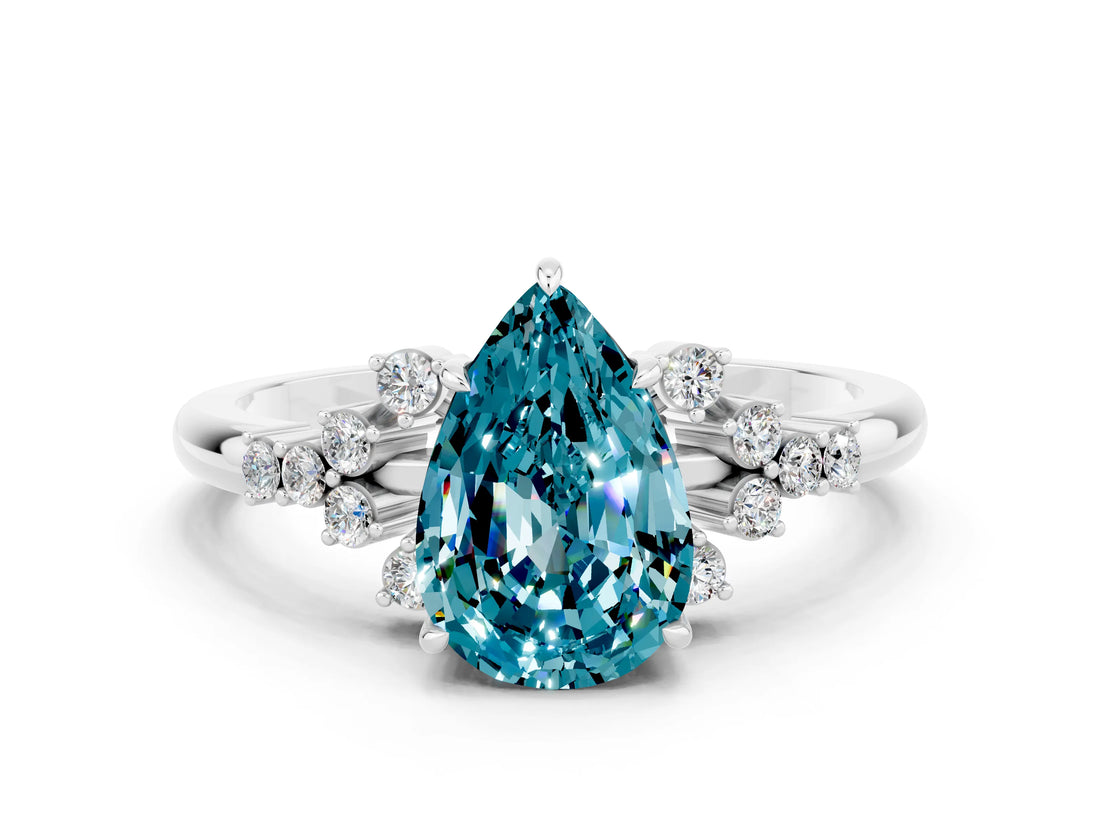 White gold Pear Cut Blue Topaz Ring with Side Stones and Four-Prong Setting_36
