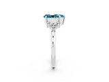 White gold Pear Cut Blue Topaz Ring with Side Stones and Four-Prong Setting_38