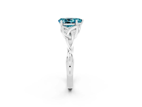 Platinum Pear Cut Blue Topaz Solitaire Celtic Knot Ring with Four-Prong Setting