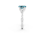 White gold Pear Cut Blue Topaz Solitaire Engagement Ring with Celtic Knot Band and Four-Prong Setting_2