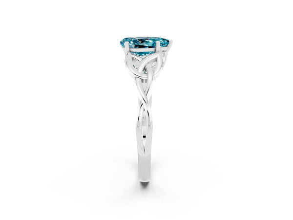 Silver Pear Cut Blue Topaz Solitaire Engagement Ring with Celtic Knot Band and Four-Prong Setting