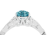 White gold Pear Cut Blue Topaz Solitaire Engagement Ring with Celtic Knot Band and Four-Prong Setting_4