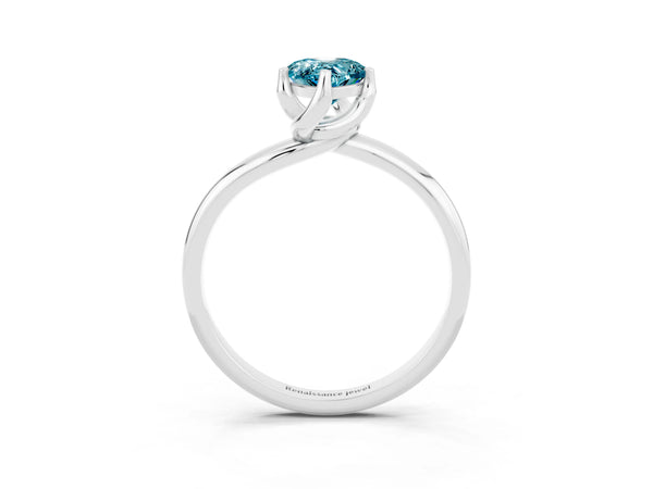 Silver Pear Cut Blue Topaz Solitaire Engagement Ring with Four-Prong Setting and Classic Band