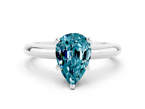 White gold Pear Cut Blue Topaz Solitaire Engagement Ring with Round Band and Four-Prong Setting