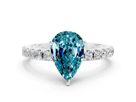 White gold Pear Cut Blue Topaz Solitaire Pavé Band with Four-Prong Setting
