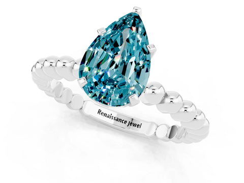 White gold Pear Cut Blue Topaz Solitaire Ring with Beaded Band and Prong Setting_1