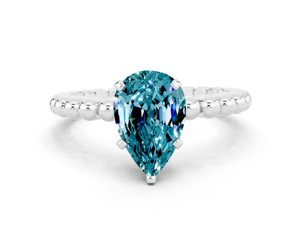 Silver Pear Cut Blue Topaz Solitaire Ring with Beaded Band and Prong Setting