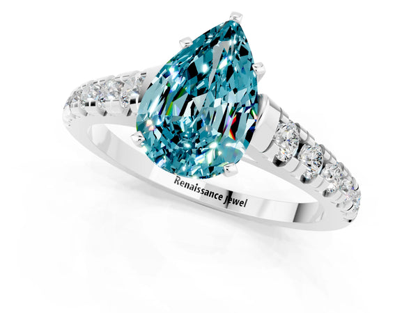 White gold Pear Cut Blue Topaz Cathedral Solitaire Ring with Round  Pavé Band