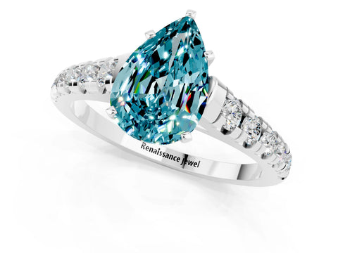 White gold Pear Cut Blue Topaz Solitaire Ring with Cathedral Setting and Pavé Band_1