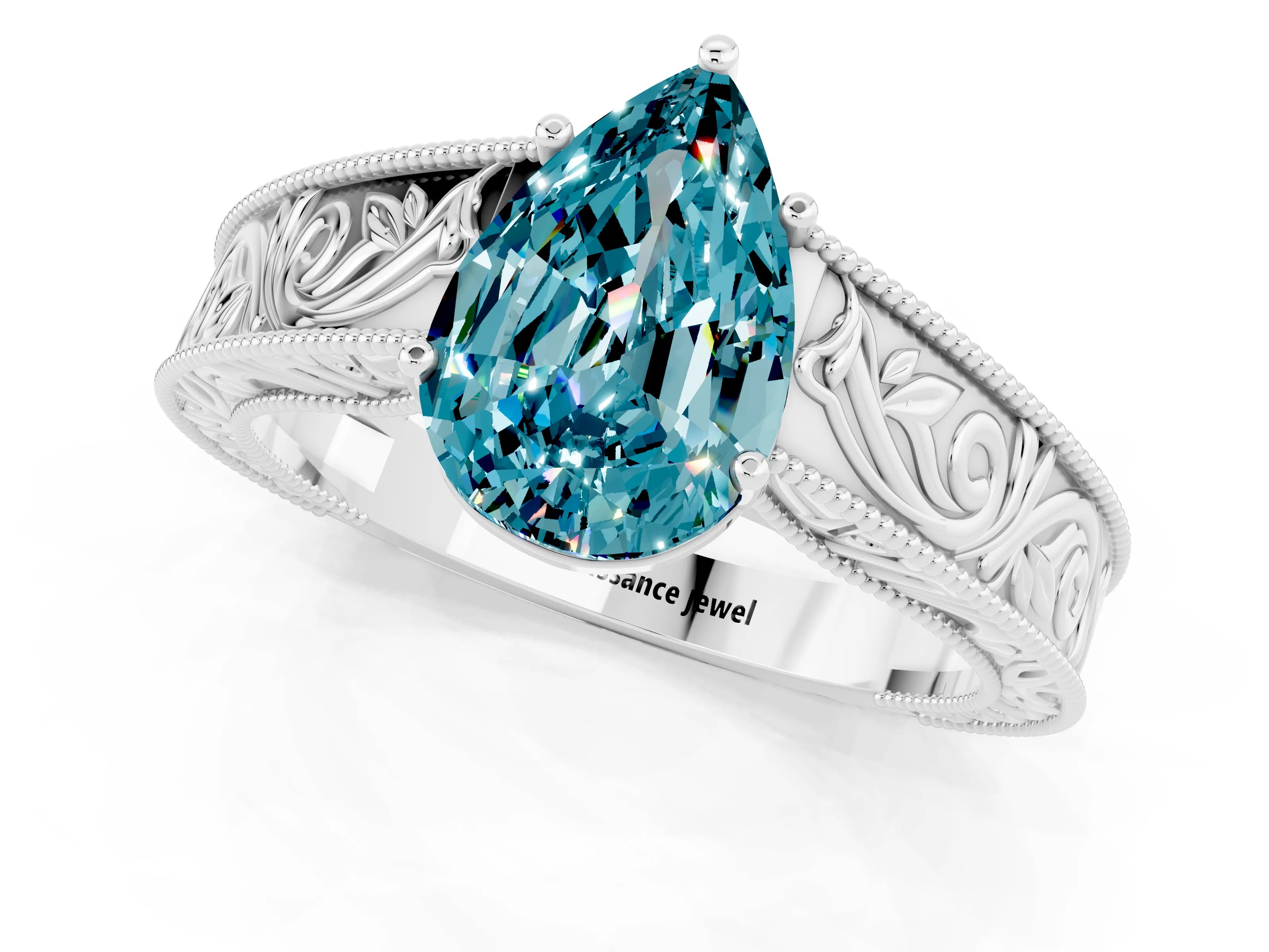 White gold Pear Cut Blue Topaz Solitaire Ring with Engraved Band and Four-Prong Setting_1