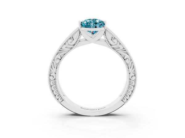 White gold Pear Cut Blue Topaz Solitaire Ring with Engraved Band and Four-Prong Setting