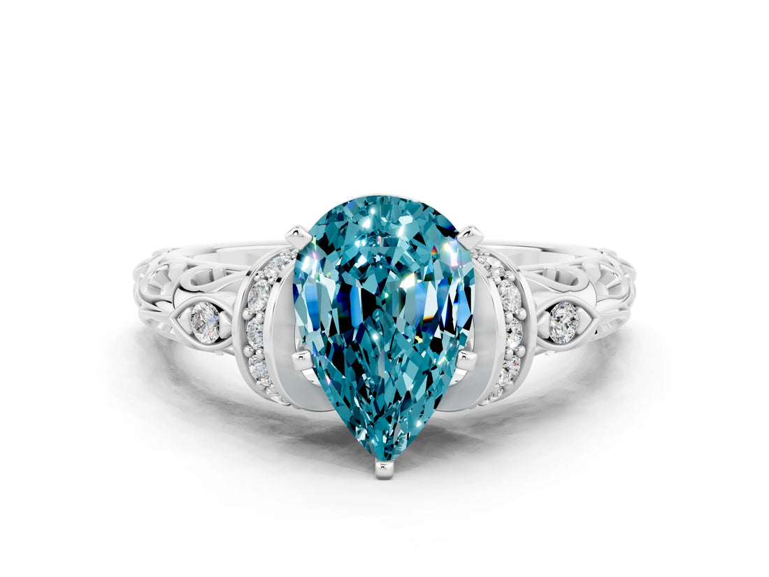 White gold Pear Cut Blue Topaz Solitaire Ring with Filigree Band and Four-Prong Setting_24