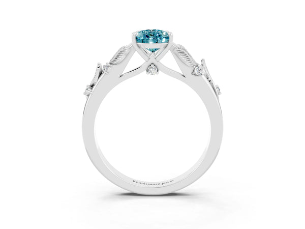 Silver Pear Cut Blue Topaz Solitaire Ring with Leaf Motif Band and Four-Prong Setting