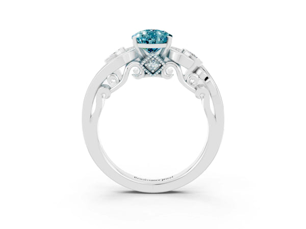 White gold Pear Cut Blue Topaz Solitaire Ring with Milgrain Pavé Band and Four-Prong Setting