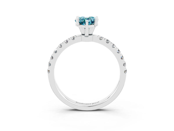 White gold Pear Cut Blue Topaz Solitaire Ring with Pavé Accents and Four-Prong Setting