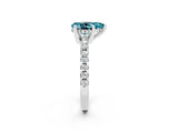 White gold Pear Cut Blue Topaz Solitaire Ring with Pavé Band and Four-Prong Setting_26
