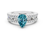 White gold Pear Cut Blue Topaz Solitaire Ring with Pavé and Channel Set Band