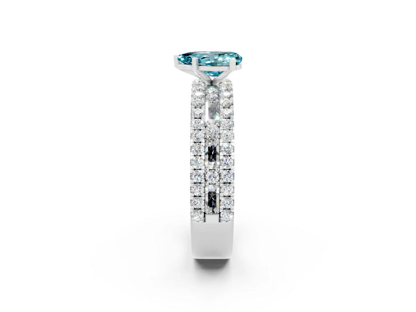 White gold Pear Cut Blue Topaz Solitaire Ring with Pavé and Channel Set Band