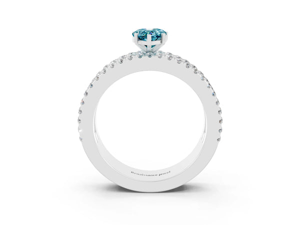 Silver Pear Cut Blue Topaz Solitaire Ring with Pavé and Channel Set Band
