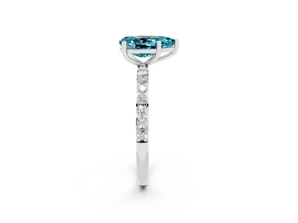 White gold Pear Cut Blue Topaz Solitaire Ring with Round  Pavé Band and Prong Setting