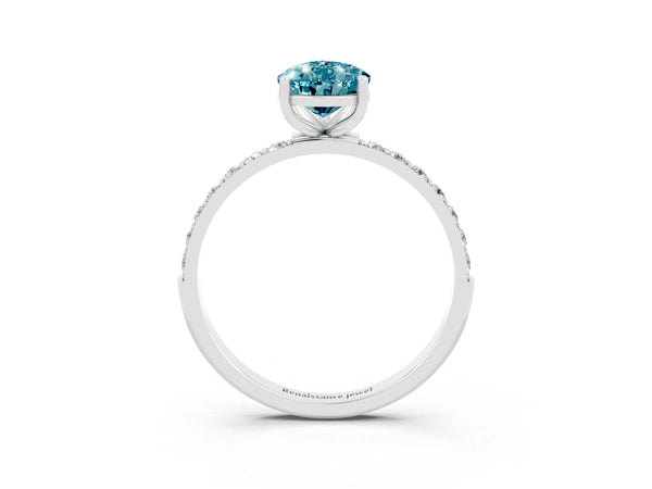 Platinum Pear Cut Blue Topaz Solitaire Ring with Round  Pavé Band and Prong Setting