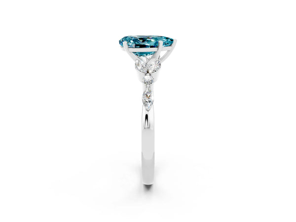 Silver Pear Cut Blue Topaz Solitaire Ring with Side Stones and Four-Prong Setting