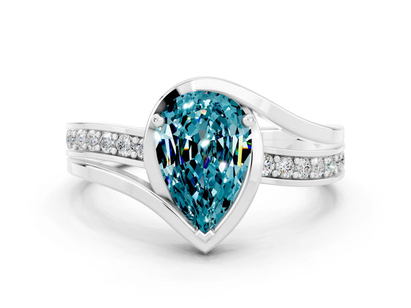 Platinum Pear Cut Blue Topaz Solitaire Ring with Split Shank and Prong Setting
