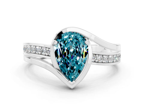 White gold Pear Cut Blue Topaz Solitaire Ring with Split Shank and Prong Setting