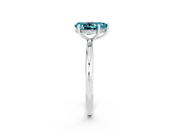 Silver Pear Cut Blue Topaz Solitaire Ring with Thin Band and Four-Prong Setting
