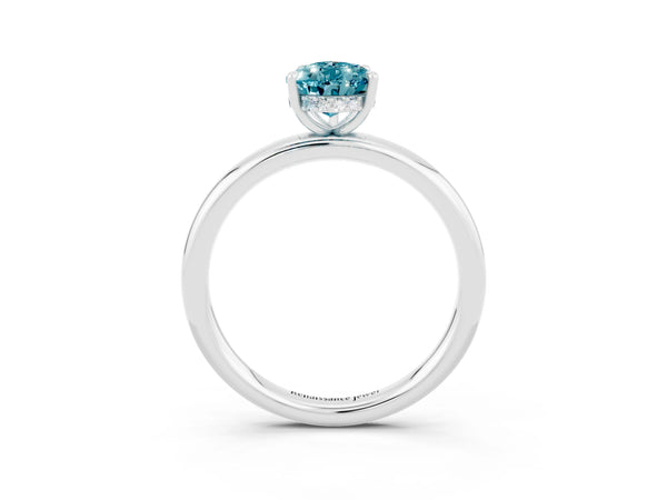 White gold Pear Cut Blue Topaz Solitaire Ring with Thin Band and Four-Prong Setting