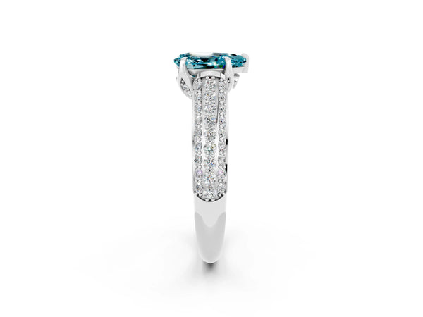 Platinum Pear Cut Blue Topaz Solitaire Ring with Three-Row Pavé Band and Four-Prong Setting