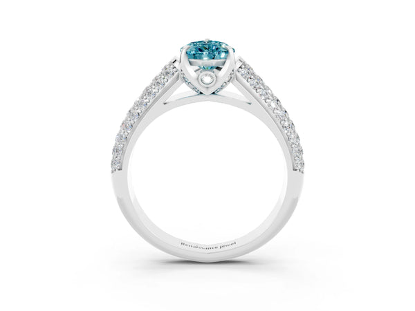 Platinum Pear Cut Blue Topaz Solitaire Ring with Three-Row Pavé Band and Four-Prong Setting