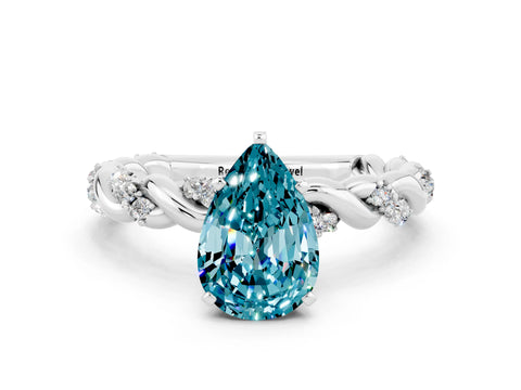 White gold Pear Cut Blue Topaz Solitaire Ring with Twisted Band and Pavé Accents