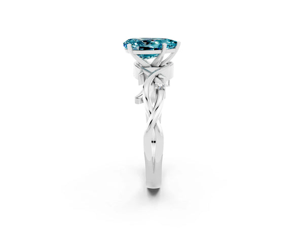 White gold Pear Cut Blue Topaz Solitaire Ring with Twisted Band and Prong Setting