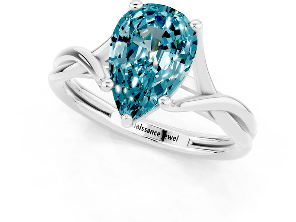 Silver Pear Cut Blue Topaz Solitaire Twist Band Prong Setting Ring
