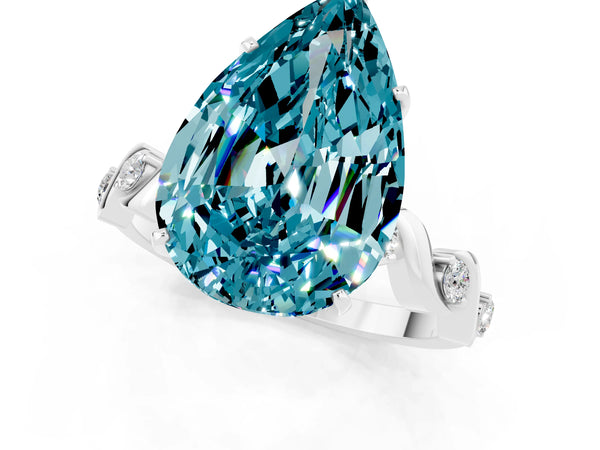 Platinum Pear Cut Blue Topaz Solitaire Twisted Band with Round  Accents and Prong Setting