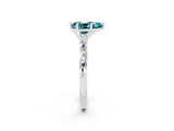 White gold Pear Cut Blue Topaz Solitaire with Side Baguettes and Channel Set Band_34