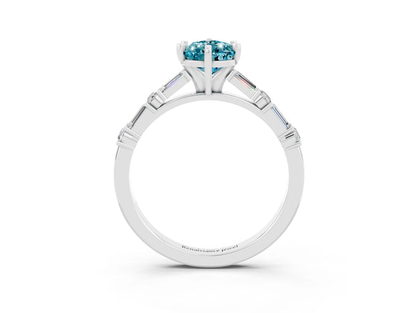 White gold Pear Cut Blue Topaz Solitaire with Side Baguettes and Channel Set Band