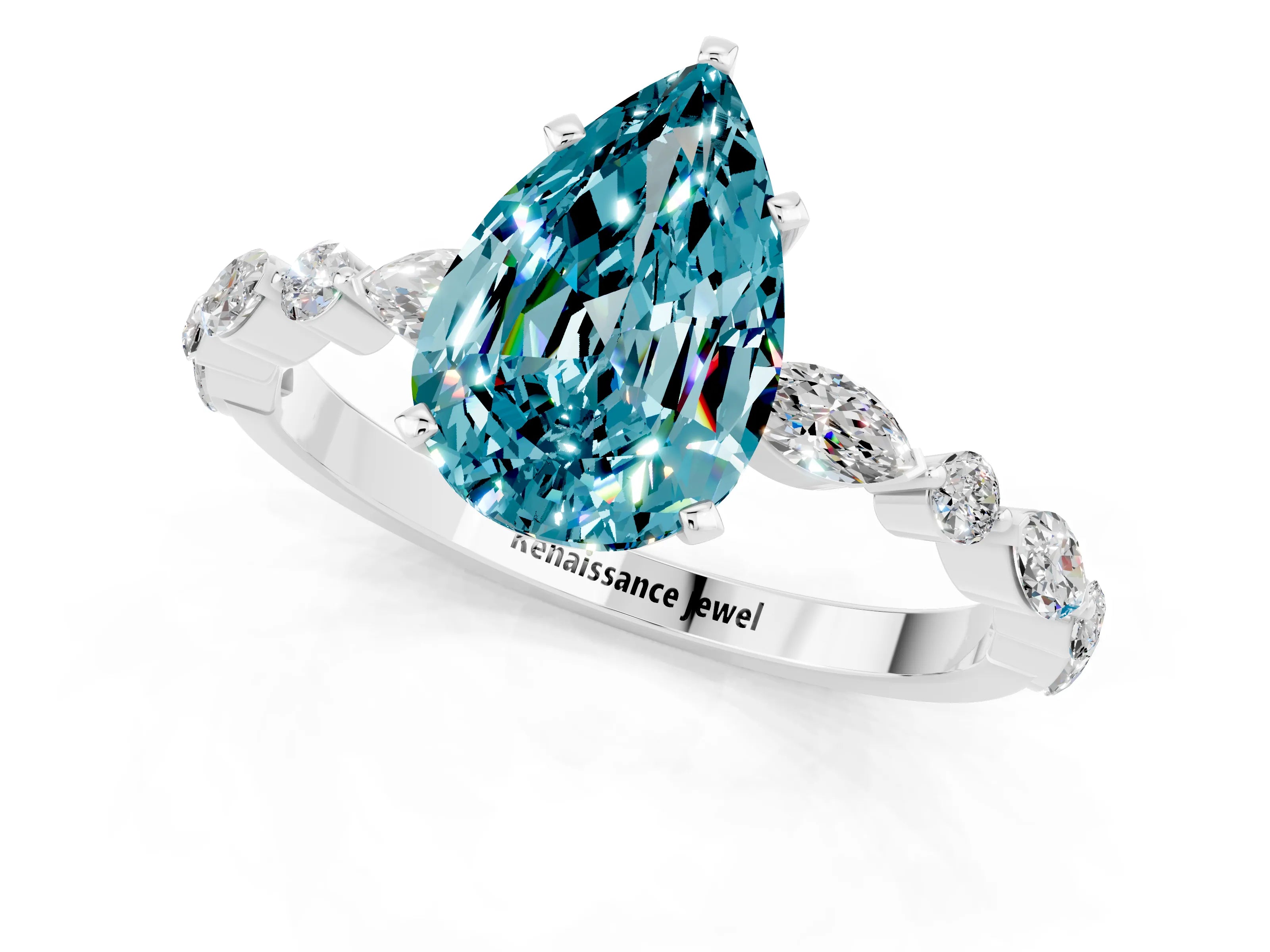 White gold Pear Cut Blue Topaz Solitaire with Side Stones on a Pavé Band and Four-Prong Setting_1