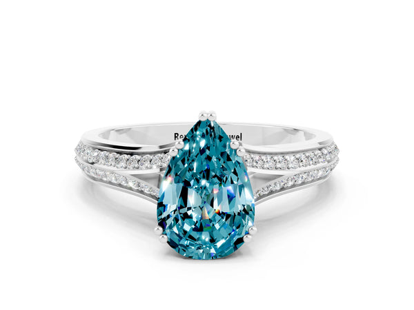 Silver Pear Cut Blue Topaz Split Shank Engagement Ring with Pavé Band