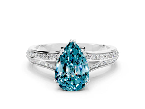 White gold Pear Cut Blue Topaz Split Shank Engagement Ring with Pavé Band