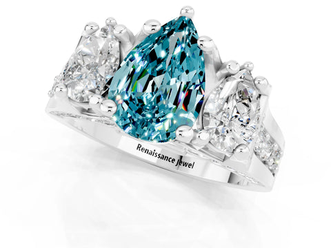 White gold Pear Cut Blue Topaz Three-Stone Ring with Channel Set Band and Four-Prong Setting_1