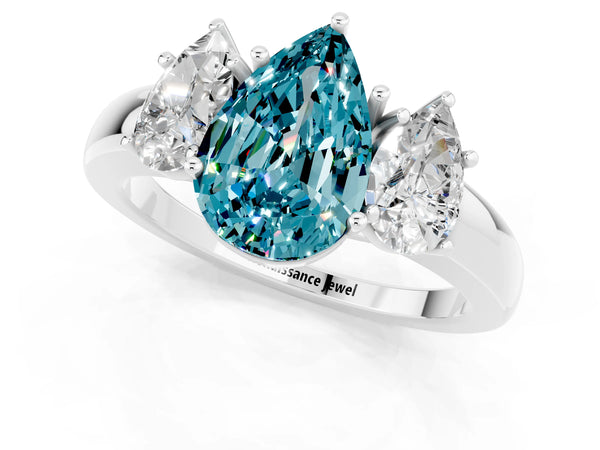 White gold Pear Cut Blue Topaz Three-Stone Ring with Four-Prong Setting and Classic Band