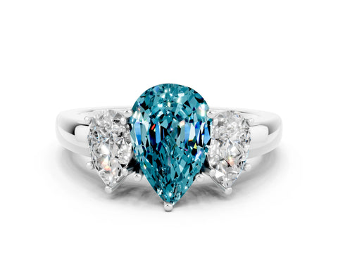 White gold Pear Cut Blue Topaz Three-Stone Ring with Four-Prong Setting and Classic Band
