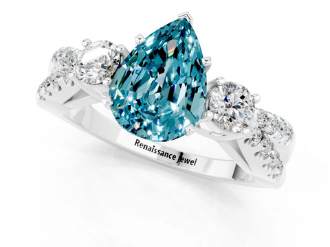 White gold Pear Cut Blue Topaz Three-Stone Ring with Pavé Split Shank and Four-Prong Setting_13